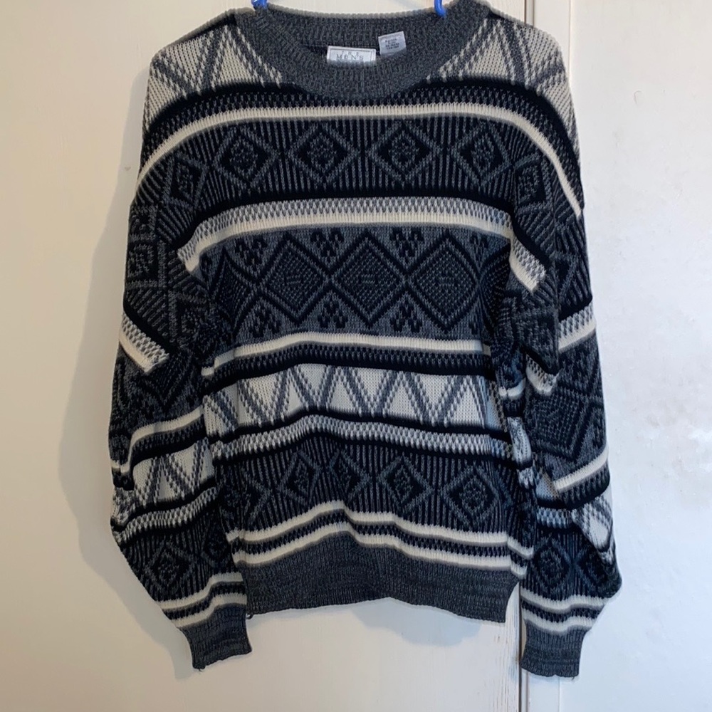 grey and white knit sweater cozy and geometric patterns